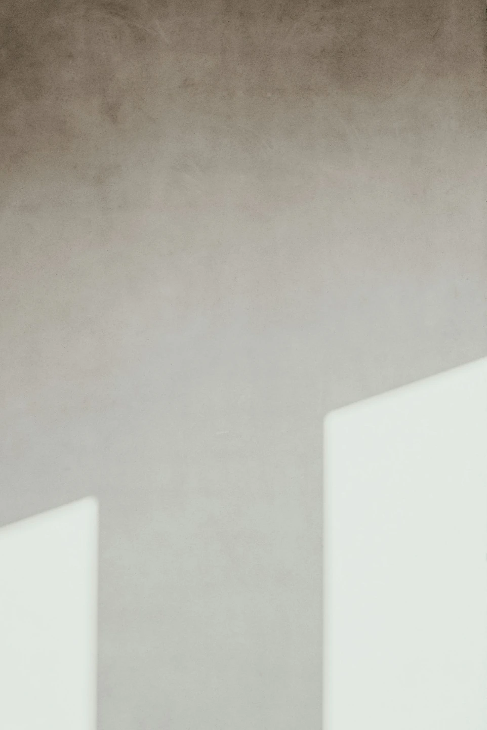 concrete wall with geometric light and shadow